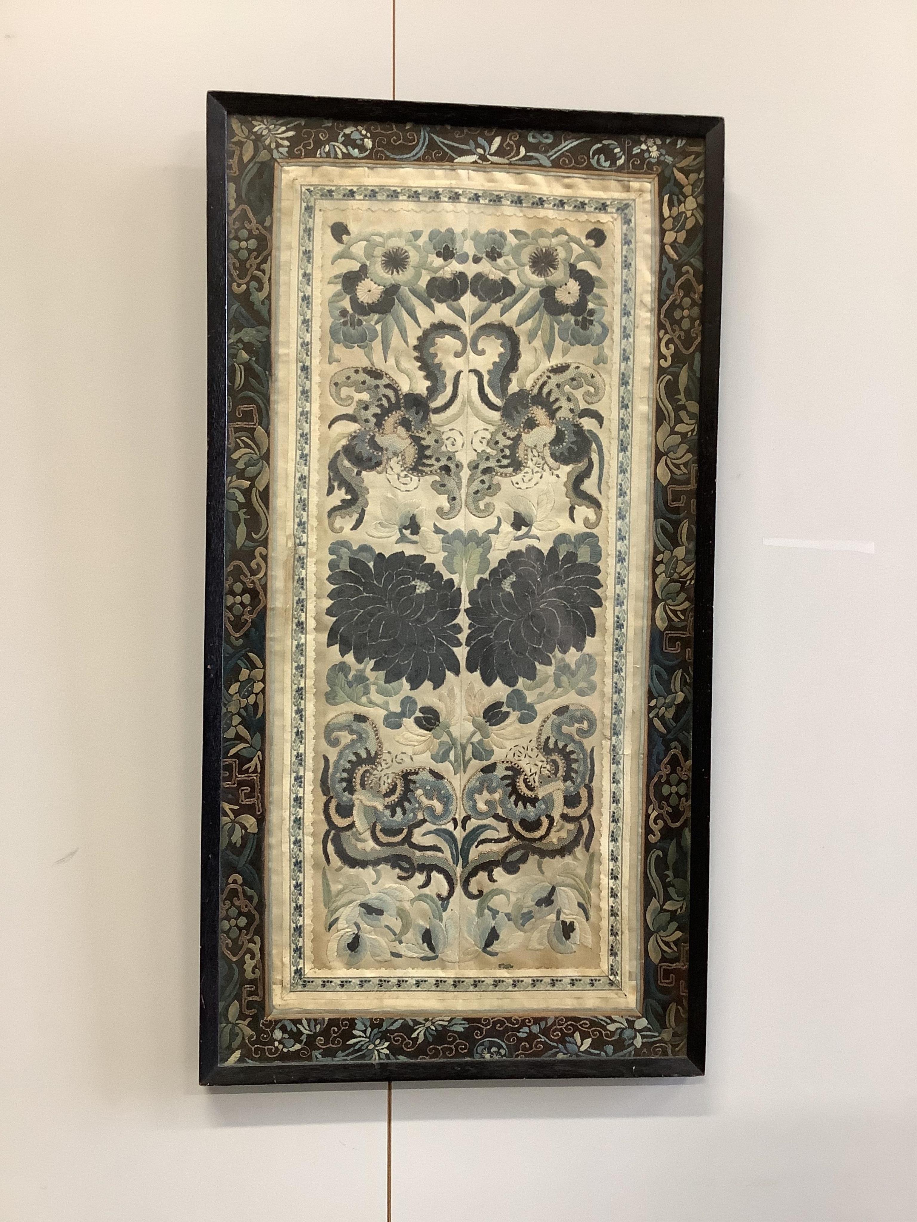 Two framed pairs of early 20th century Chinese silk embroidered sleeve bands; one pair embroidered in blue with Chinese knot as ornate bat motifs surrounded by floral motifs, edged in fine braiding and a black satin, sil